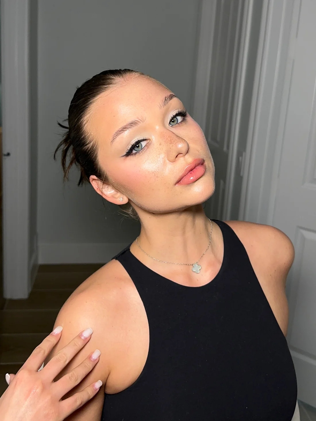 Dewy makeup with soft pink tones